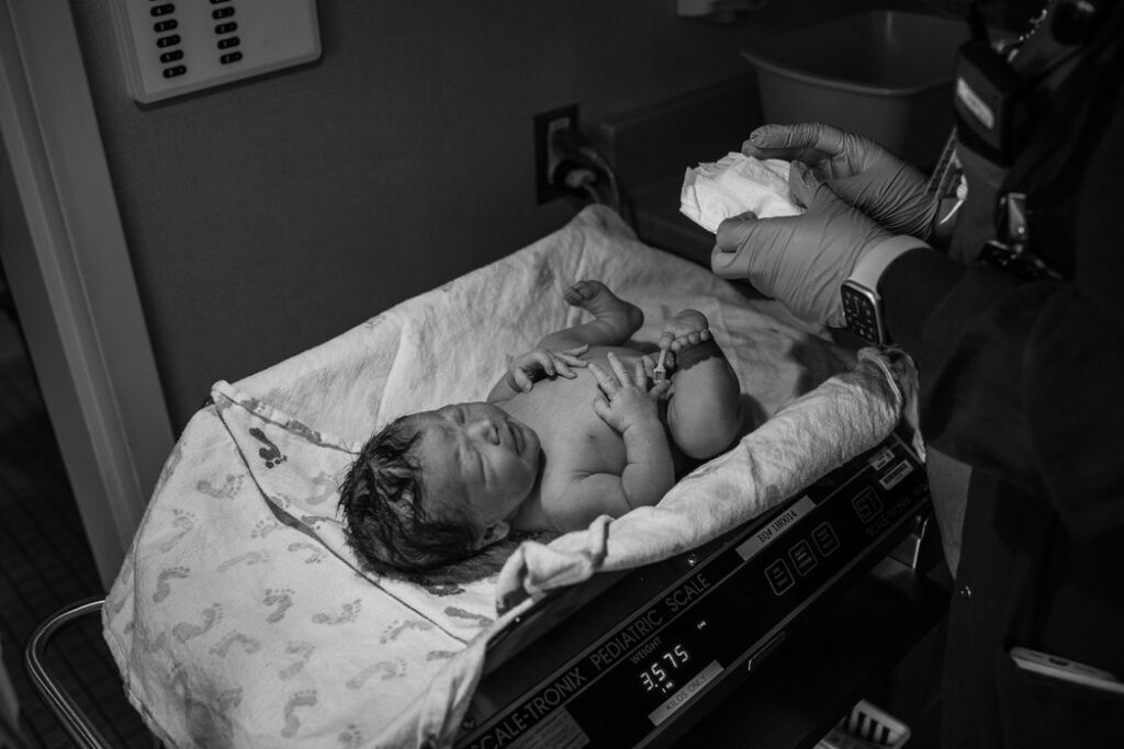 Newborn exam captured by Eugene Oregon birth photographer Lux Marina Photography